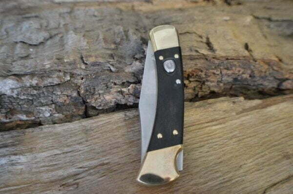 Buck 110 Ebony Wood knives for sale